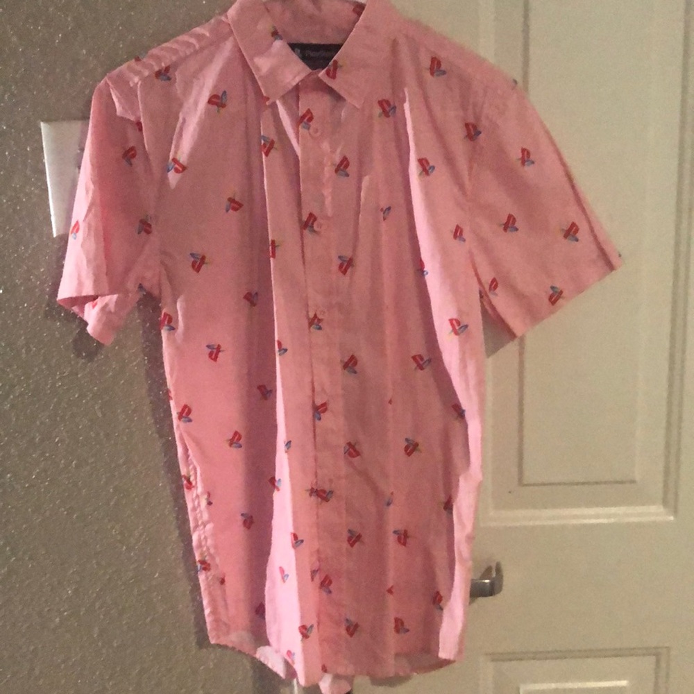 Beautiful unisex PlayStation button down shirt.